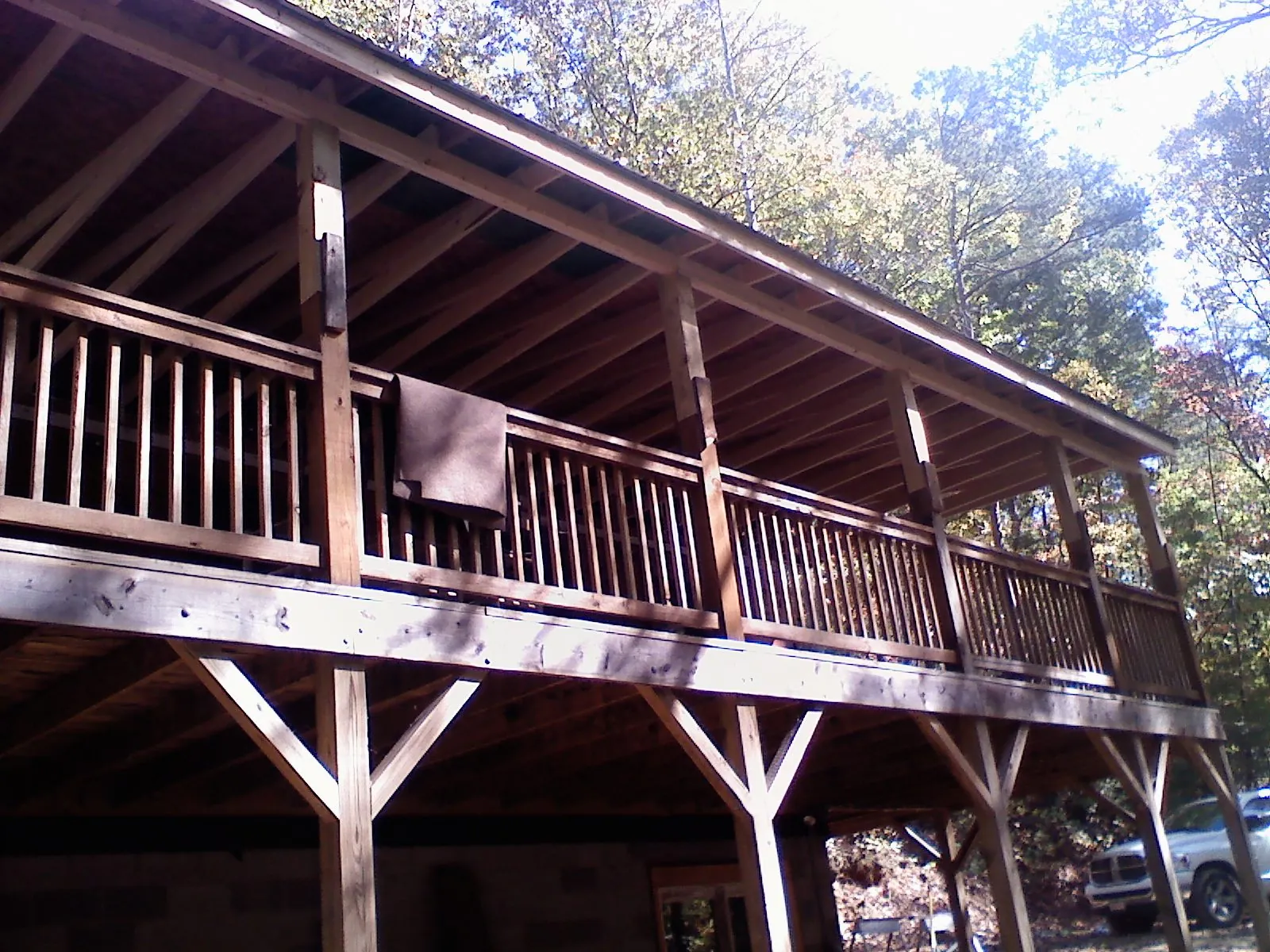 Timber framing under a new elevated porch and deck — Roof Leak Repair in Hillsdale by Roofing Brothers